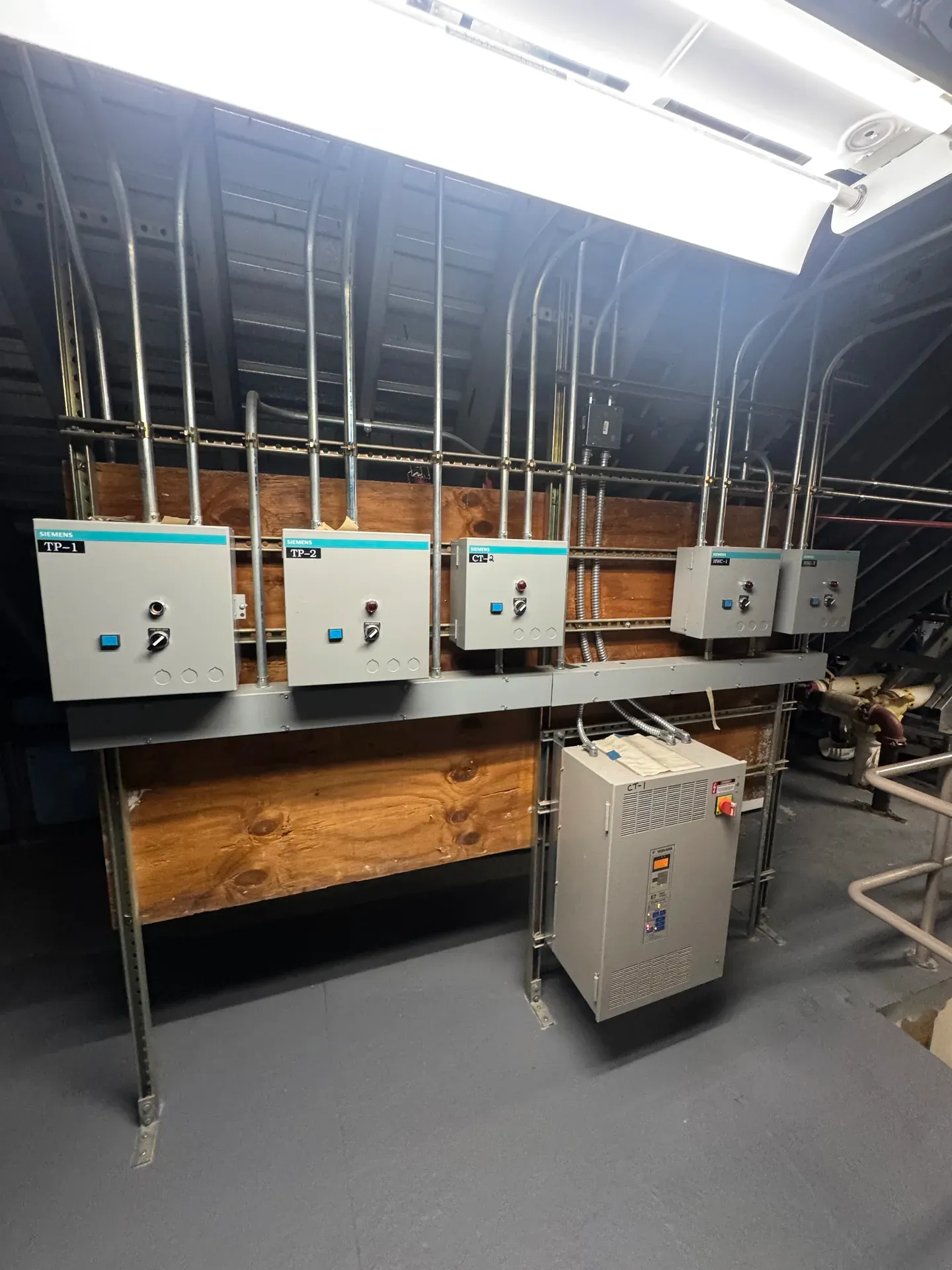 Commercial Siemens motor starter and VFD lineup in mechanical room