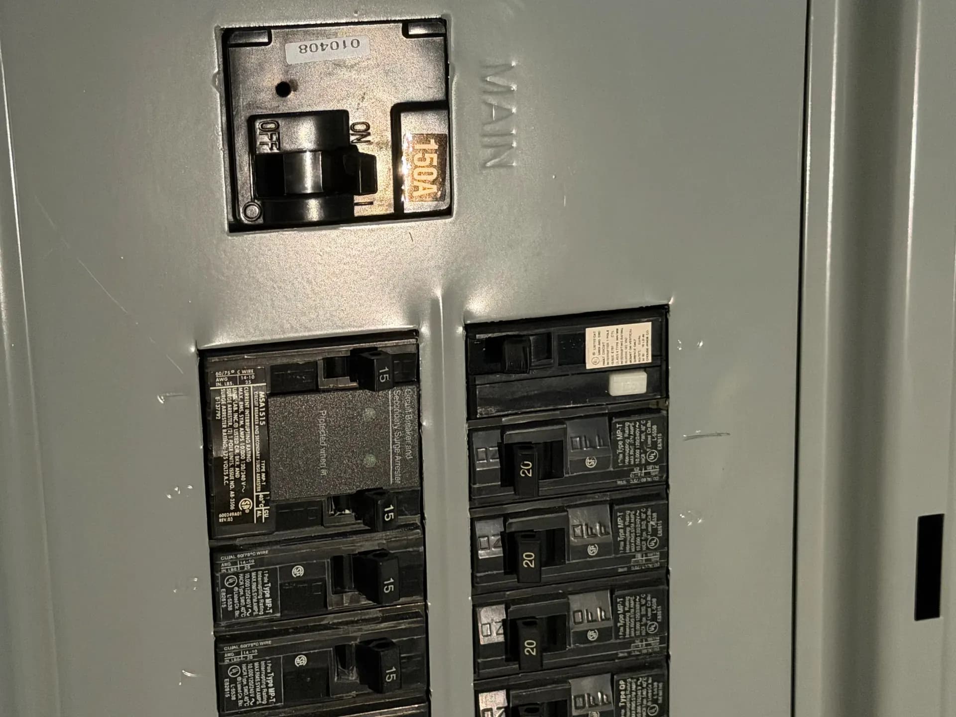 Whole-house surge protector at breaker panel